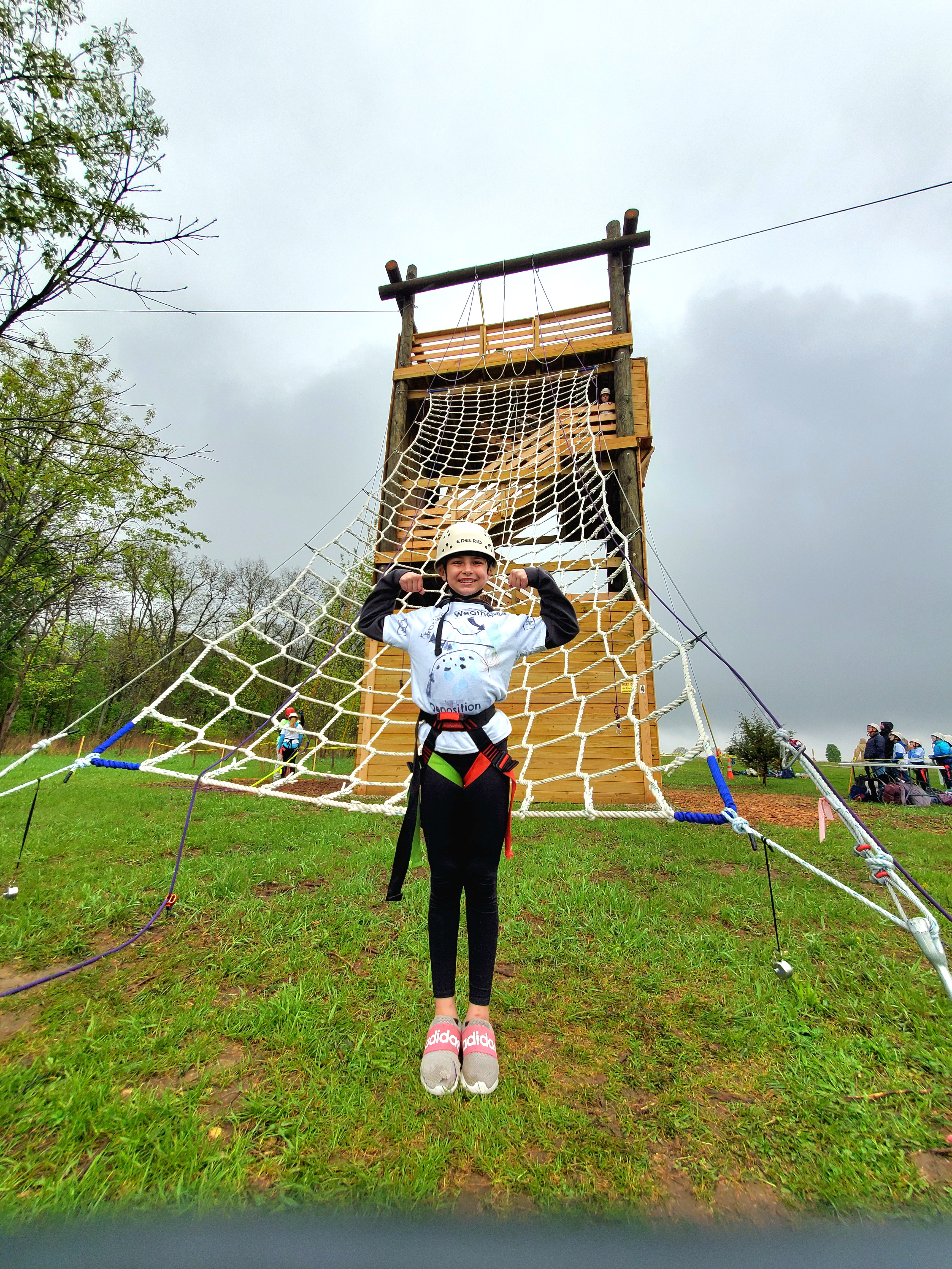 child on climbing tower