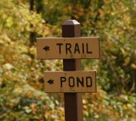 trail and pond sign